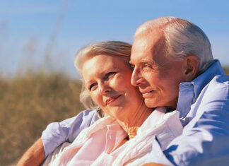 senior couple on beach