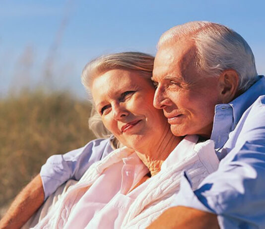 senior couple on beach