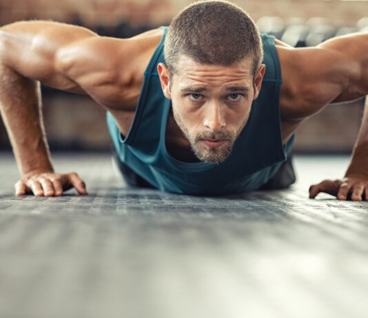 Young athlete doing push ups