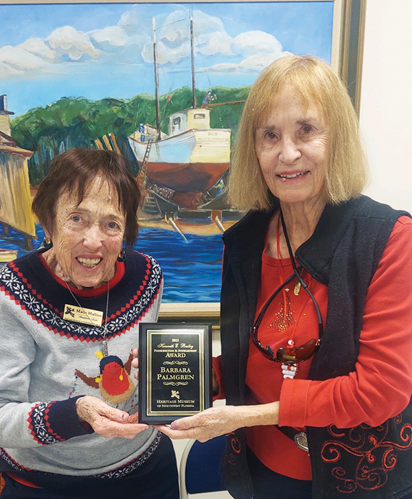 Dr. Marie Hallion presented Dr. Barbara Palmgren the museum’s annual award for outstanding service to the Heritage Museum of Northwest Florida.