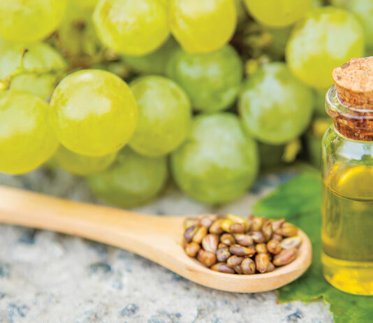 grape seed oil in a small jar. Selective focus.nature