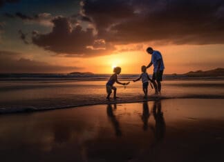 A Pastor’s Ponderings: Happy Father’s Day – Standing Firm in Faith as Anchors in the Storm Dad Sunset with 2 children