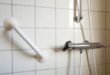 Shower and handrail for elderly