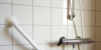 Shower and handrail for elderly