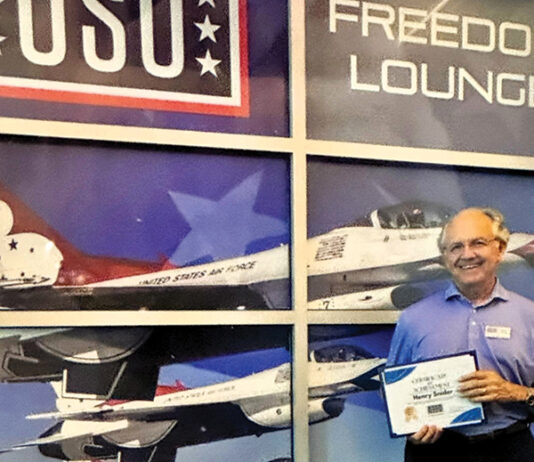 Mid-Bay Rotarian Henry Snider USO Vol of Year