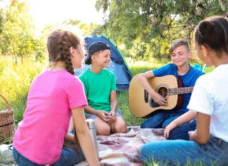 Music Lessons: Inspiring Generation Alpha to Think for Themselves Group of children resting at summer camp