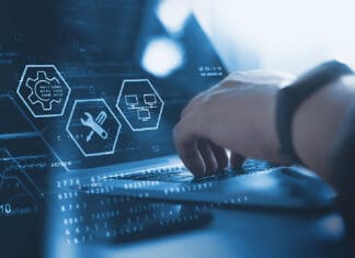 5 Benefits of Outsourcing Your Business IT IT support, customer service concept. Computer engineer, technician coding on laptop computer connection with big data storage as backgrounds, digital technology, database, data management