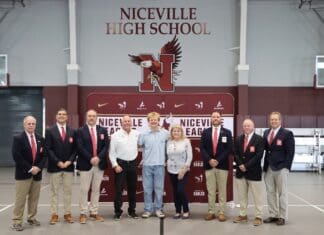 NHS Senior Harper Campbell Awarded Prestigious Taylor Haugen Trophy Campbell with Haugens and All Sports Association.j