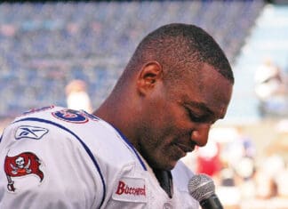 Derrick Brooks Headlines 2026 ASA Banquet Derrick Brooks with 2006 Pro Bowl MVP trophy 060210 N 4856G 129