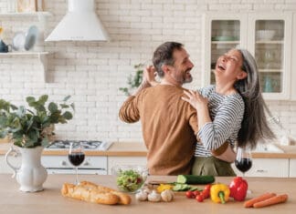 Where Has The Love Gone? Happy Couple in Kitchen iStock 1328351784