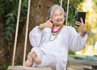 The Menopause Conversation Every Woman Needs (But Rarely Gets) Tortoise Older lady swinging iStock 2168569975