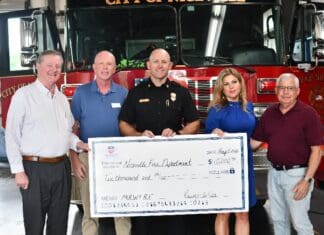 Niceville Fire Department Expands Lifesaving Capabilities Through New Paramedic Program Niceville Fire Department Check Presentation Group Photo