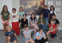 Museum Series Museum Camp in front of Trumbell painting siging the Declaration of Independence